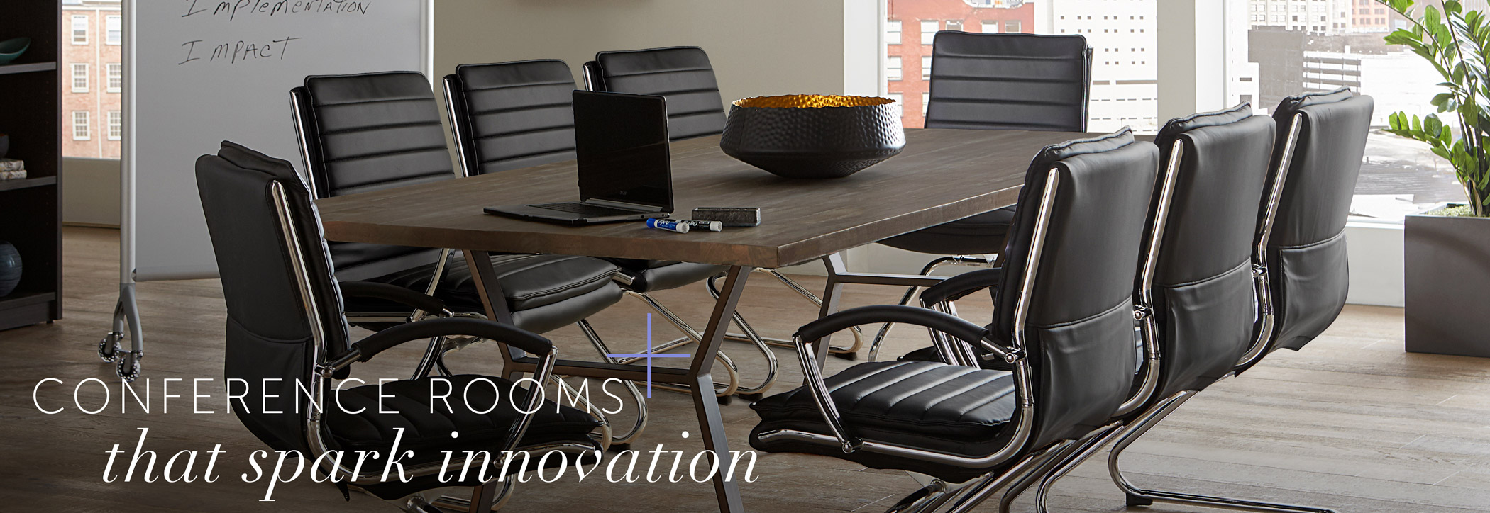 Rented conference table with words ‘conference room that sparks innovation’